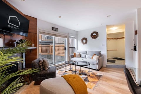 Living area: Queen sofa bed, fireplace, private deck access