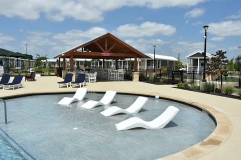 Sun-soaked tanning ledge with in-water loungers. This is your afternoon