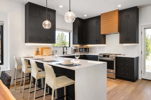 Spacious kitchen island featuring seating for 4