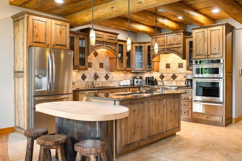 Fully stocked kitchen with stainless steel appliances