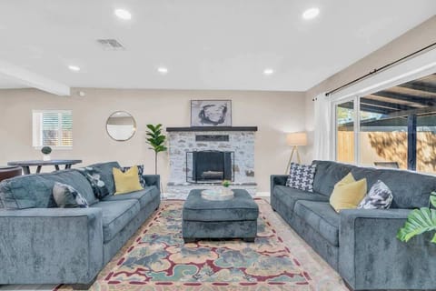 Spacious living room with comfortable couches.