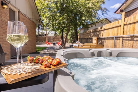 The main event: your private hot tub, 26 jets running, seats 6. Open year-round.