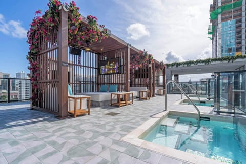 Recharge in the upper-level spas or grab a cabana & cool off in the shade​