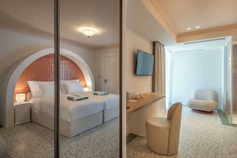 Junior Suite, Balcony, Pool View | In-room safe, blackout drapes, soundproofing