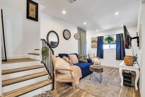 Cozy living room featuring a 55" Smart TV with DirecTV/Cable, Netflix, You Tube 