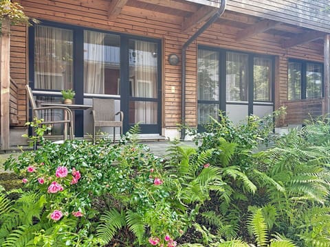 Wood, Shrub, Door, Siding, Garden, Cottage, Yard, Wood Stain, Shade, Design