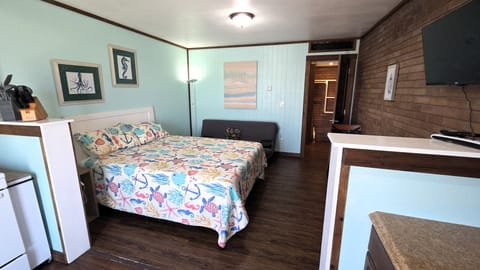 #101 is a studio with a queen bed and a futon that sleeps two children under 12