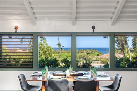 Gather around the dining table while enjoying beautiful ocean views and abundant natural light.