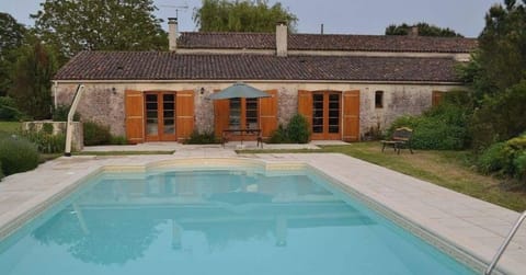 Large patio with outdoor dining and sun loungers plus acres of garden to play in with all kinds of fruit trees - fig , pomegranate , apple, plum , quince   