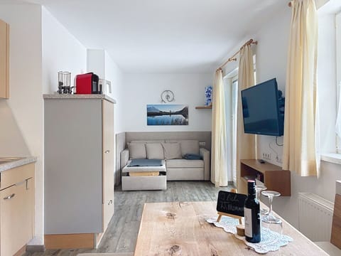 Furniture, Interior Design, Apartment, Floor, Room, Chair, Living Room, Couch, Wood Stain