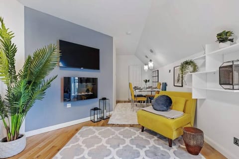 Relax and read by the cosy  fire place.