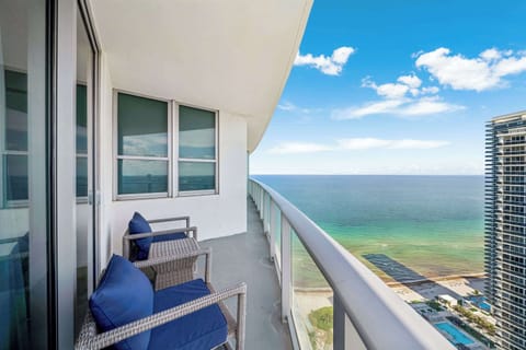 Step onto your private balcony and take in sweeping ocean views.