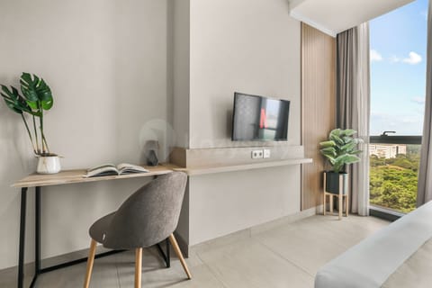 Apartment, 1 Bedroom, City View | Desk, laptop workspace, iron/ironing board, WiFi (free)