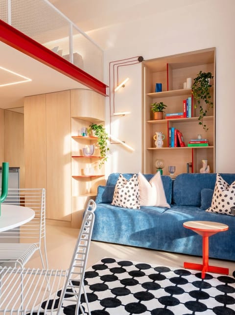 Beautiful loft apartment with living room in lower floor and two queen size beds in upper floor to accommodate up to 6 people