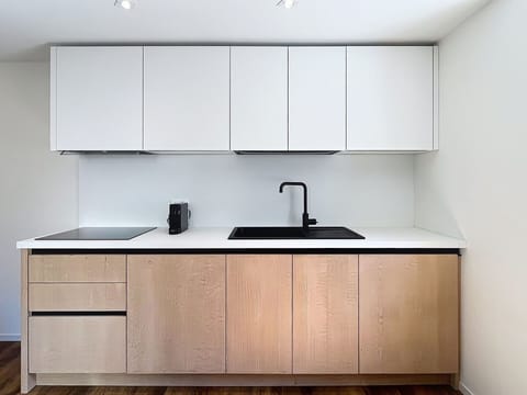 Wood, Flooring, Cabinetry, Countertop, Interior Design, Kitchen, Furniture, Sink, Floor, Tap