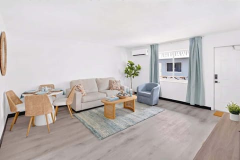 Settle into the comfortable living room, featuring cozy seating and a Smart TV for relaxing after a day out.
