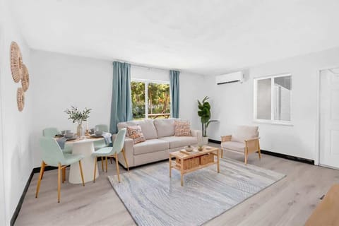 Relax in the inviting living room with comfortable seating and a Smart TV after a day of exploring.