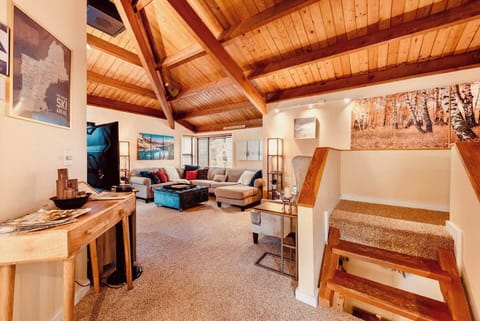cozy exposed beam living room