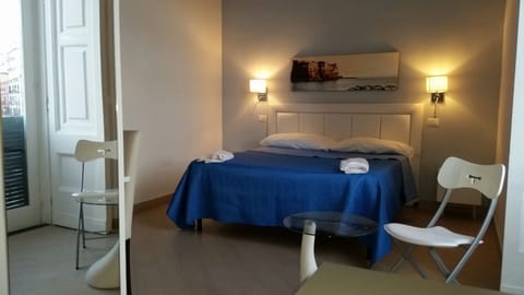 Deluxe Double Room, 1 Queen Bed, Non Smoking, Partial Sea View | Hypo-allergenic bedding, down comforters, minibar, in-room safe