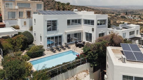 Wake up to breathtaking panoramic views across Pissouri Bay from your own private villa.