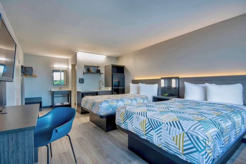 Desk, laptop workspace, blackout drapes, iron/ironing board