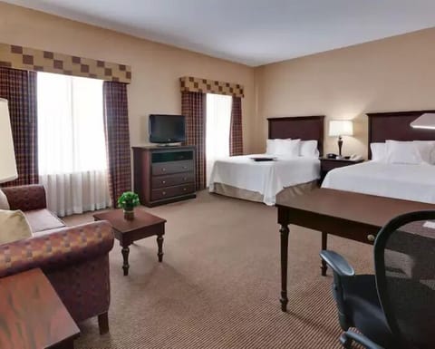 In-room safe, desk, iron/ironing board, cribs (free)