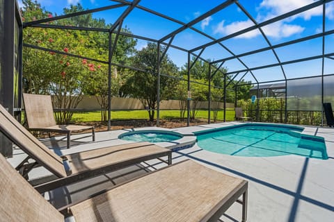 Spacious outdoor oasis with plenty of room to swim, lounge, and soak up the Florida sunshine.