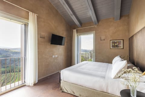 Deluxe Apartment, Hill View | In-room safe, desk, laptop workspace, blackout drapes