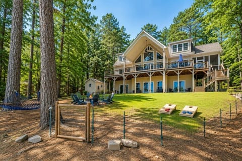 Lakeside Yard w/yard games, firepit, and hammock.