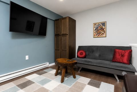 Relax with a 55” TV and comfy futon for lounging or extra guests.