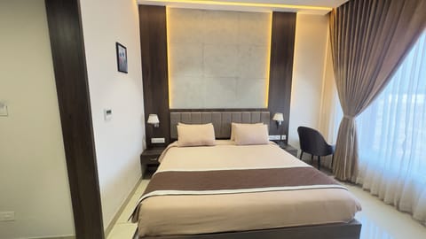 Executive Double Room, City View | Desk, laptop workspace, soundproofing, iron/ironing board