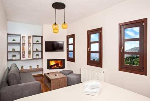 Junior Suite with Fireplace, Living Area and Panoramic Views