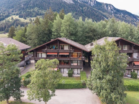 Traditional chalet-style holiday building surrounded by the peaceful alpine scenery of Diemtigtal.
