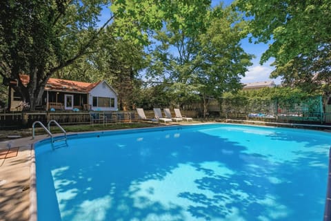 Make a splash in your own private pool, surrounded by shady trees and plenty of space to lounge