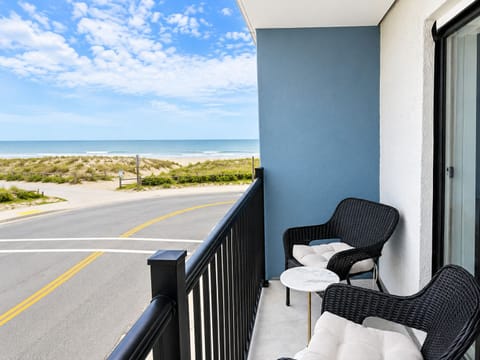 Private balcony with cozy seating and beautiful ocean views