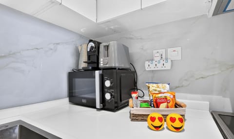 Standard Apartment, City View | Private kitchen | Coffee/tea maker