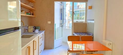 Comfort Apartment, City View | Private kitchen | Coffee/tea maker, full-size fridge, microwave, oven