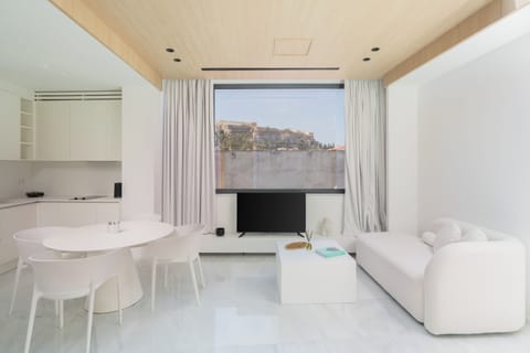 Penthouse, 2 Bedrooms, Balcony, City View | Living area | 43-inch Smart TV with digital channels, Netflix, streaming services