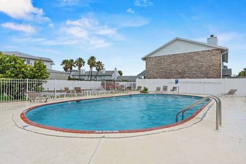 Cool off with a refreshing swim in the community pool, the perfect spot to relax.