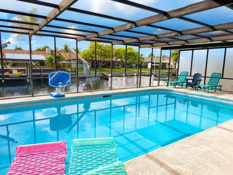 Enjoy beautiful sunsets overlooking the canal from the back pool deck