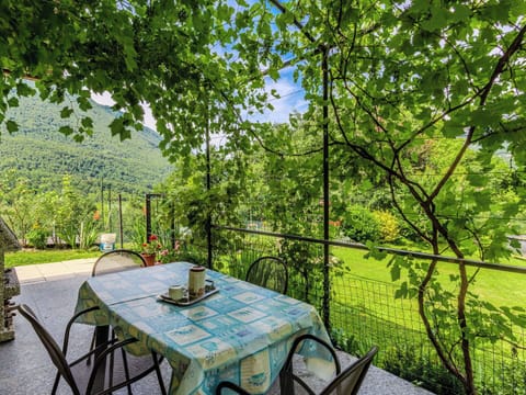 Furniture, Chair, Outdoor Table, Outdoor Furniture, Kitchen & Dining Room Table, Garden, Eco Hotel, Shade, Yard, Backyard