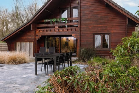 Your home for the weekend — a stunning timber chalet with terrace dining and a garden made for gathering