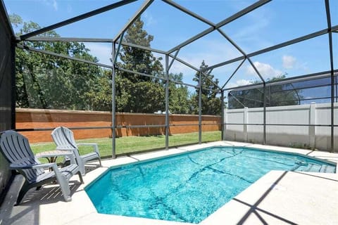 Soak up the Florida sunshine in your private screened pool, the perfect place to relax after an exciting day at the nearby theme parks.