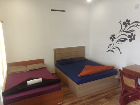 Standard Quadruple Room, 2 Double Beds, Mountain View | Laptop workspace, WiFi (free), individually decorated