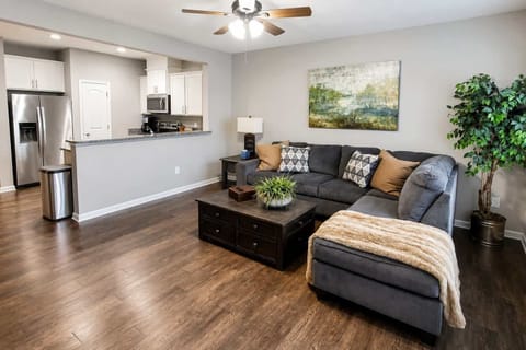 Open-plan living with sectional & chaise lounge