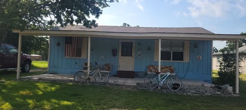 Most recent pic with front door painted the trim color.