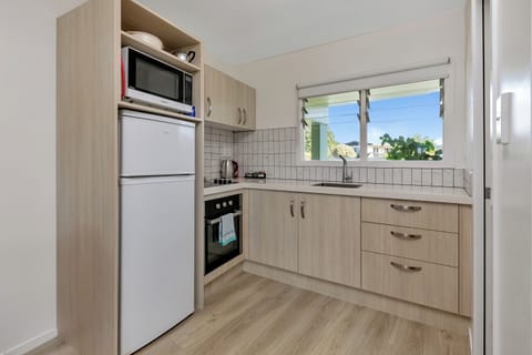 Apartment, Balcony, Sea View | Private kitchen | Full-size fridge, microwave, oven, stovetop
