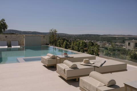 Relax in comfy lounge seating with peaceful countryside views and sunshine.