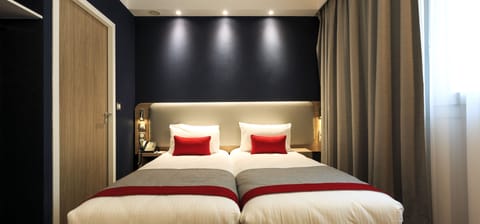 Hypo-allergenic bedding, down comforters, pillowtop beds, in-room safe