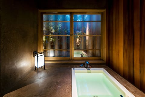 Traditional House, 4 Bedrooms, Kitchen, Garden View | Bathroom | Combined shower/tub, deep soaking tub, rainfall showerhead